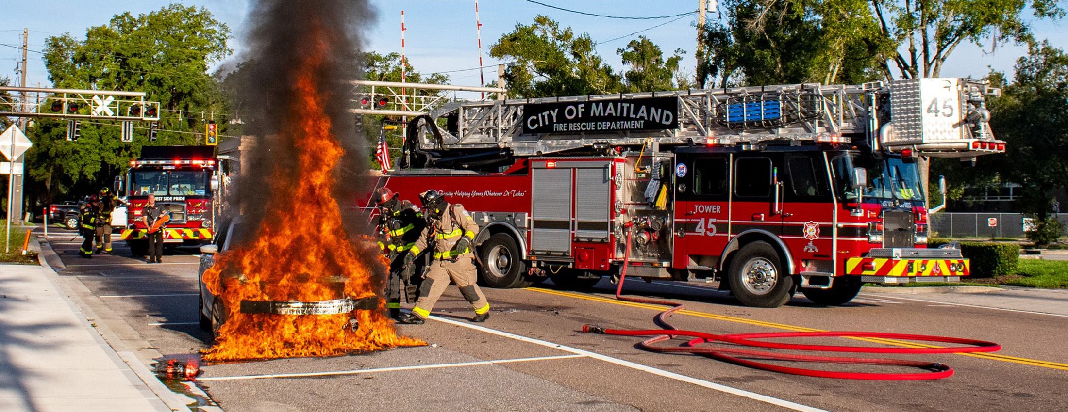 Maitland firefighters working alongside fire apparatus